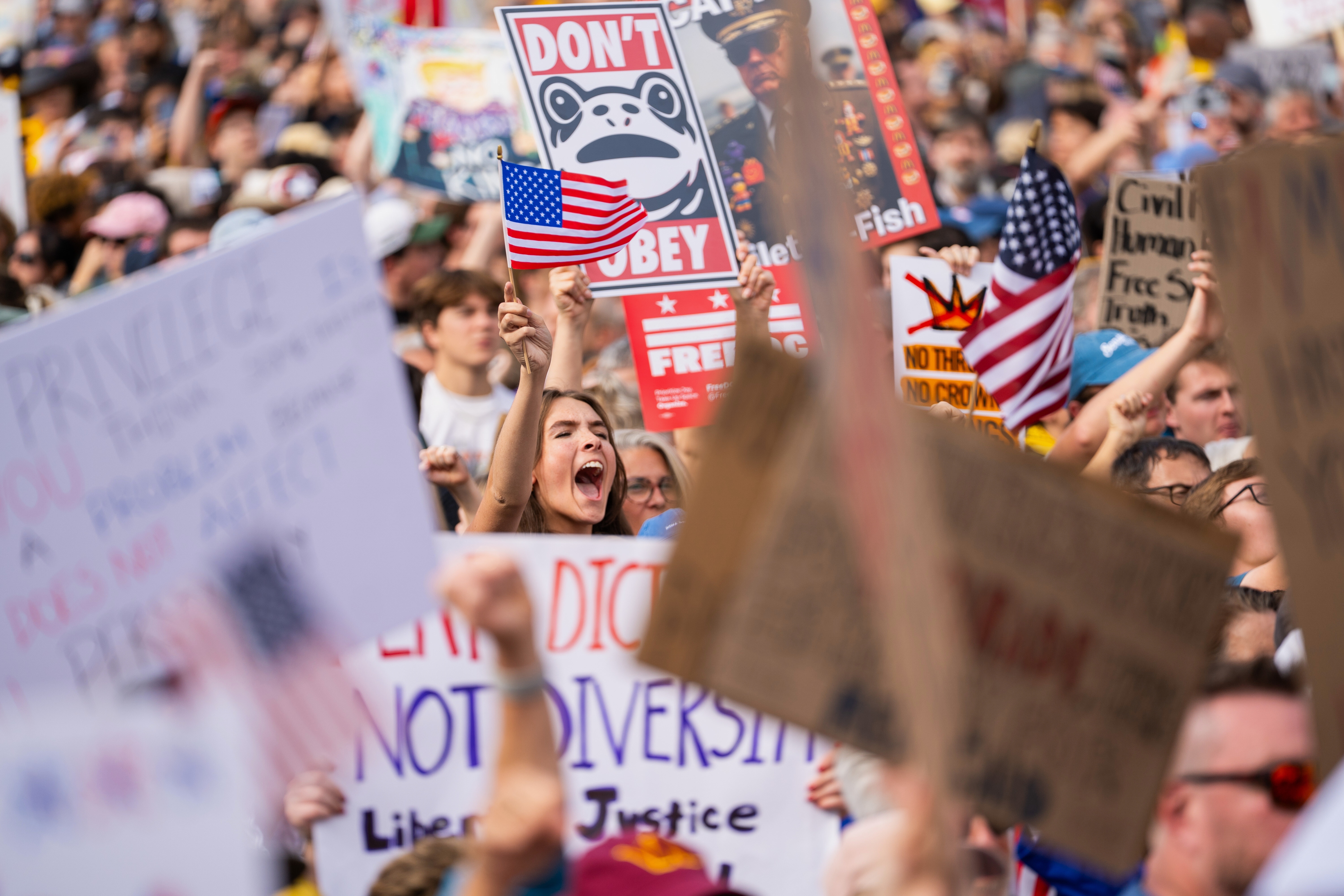 Crowds gather to listen to Sen. Bernie Sanders, I-Vt., during a No Kings protest, Saturday, Oct. 18, 2025, in Washington.
